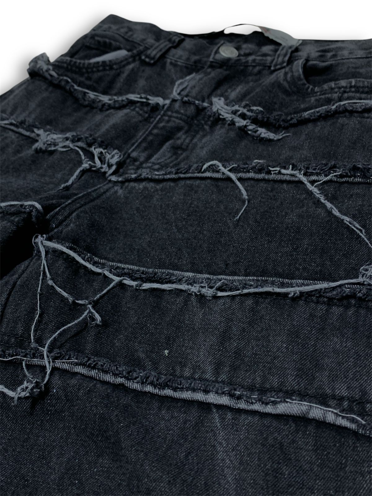 JEAN INVERTIDO CON DESGASTES.
