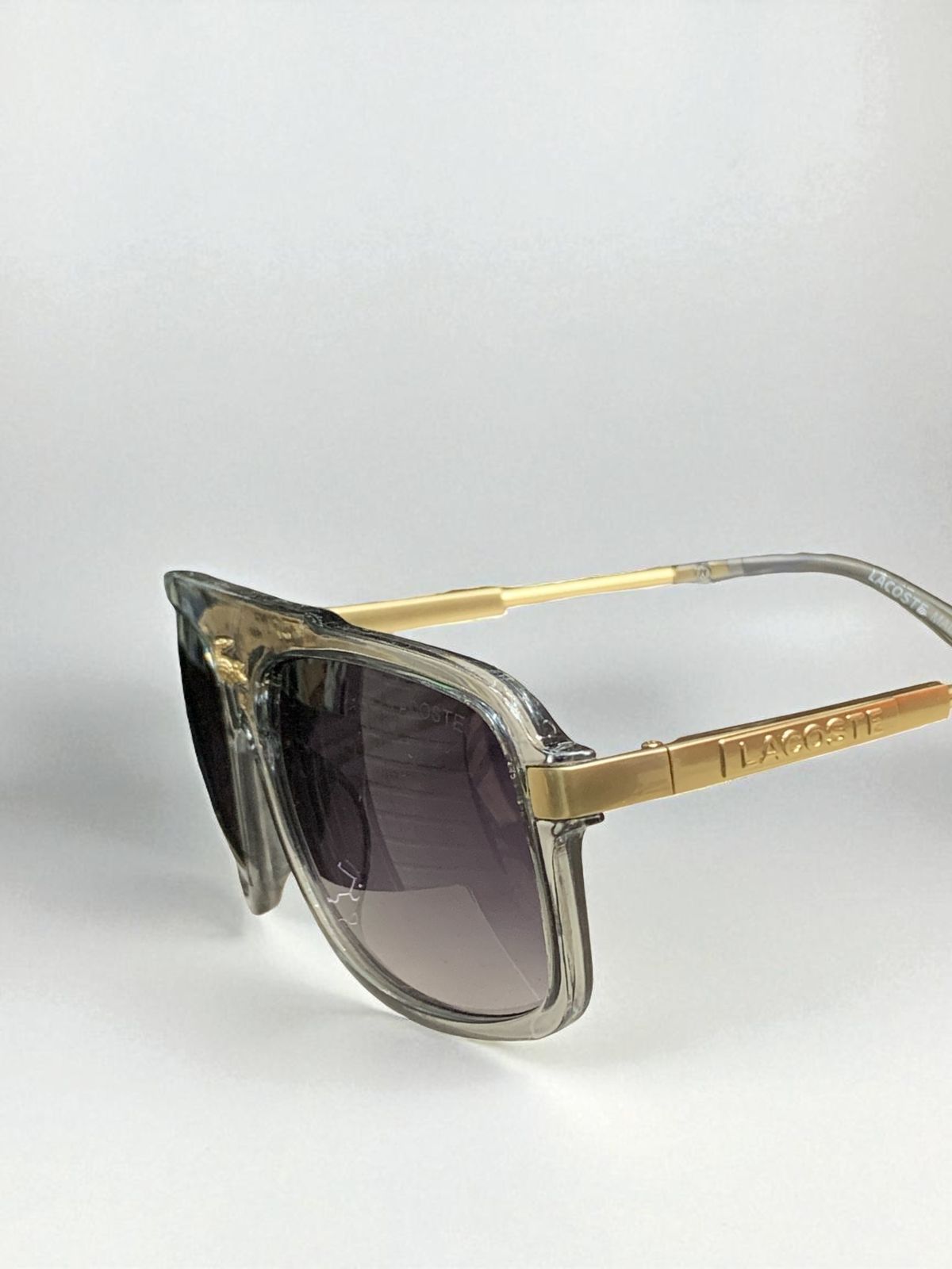 LENTES DE LUJO LACOSTE.