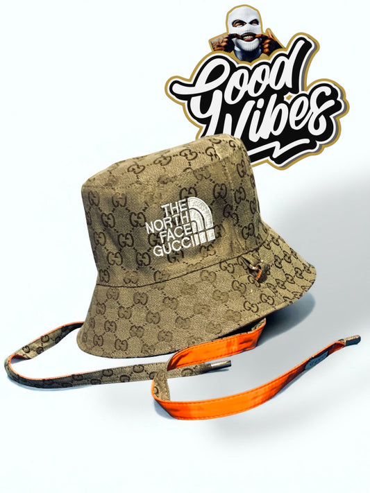 GORRO PESQUERO GUCCI X NORTH FACE.